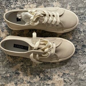 Cream color sneakers , brand casual corner ,